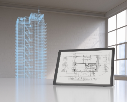 3d rendering of building next to tablet